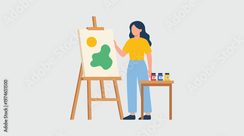 Woman painting on an easel indoors.