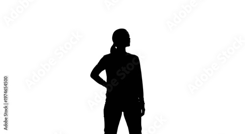 Silhouette of a Woman Standing with Hand on Hip, Looking Away