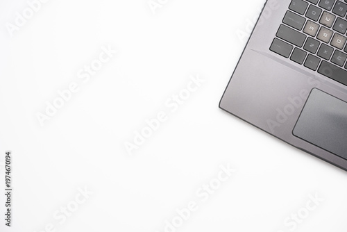 Laptop corner on clean background with copy space for business or remote work concept