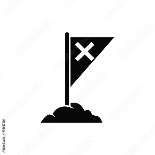 Black flag with white cross planted in a mound of soil