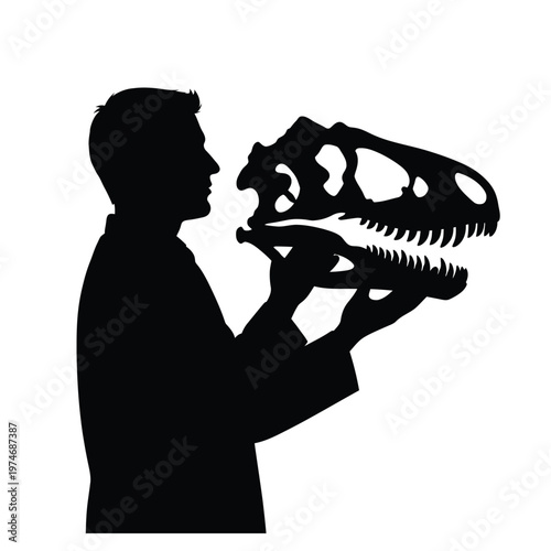Silhouette of a person holding a dinosaur skull