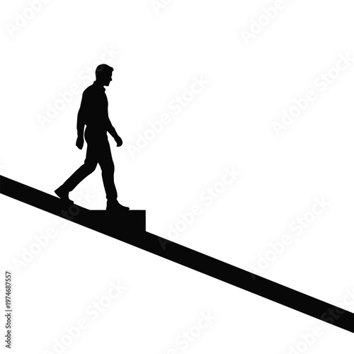 Silhouette of man walking up steep incline or staircase