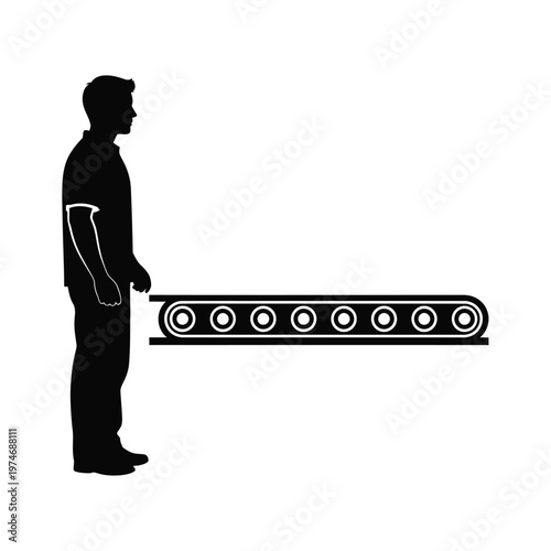 Silhouette of person standing next to black conveyor belt with wheels