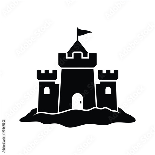 Black silhouette of a sand castle with flag on