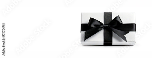 White gift box with black bow. Surprise. No white background isolated.