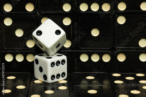 Dice In Balanced Formation Surrounded By Dominoes