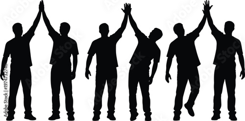 Silhouette of successful business team men giving high five to each other as symbol of teamwork cooperation achievement and partnership success
