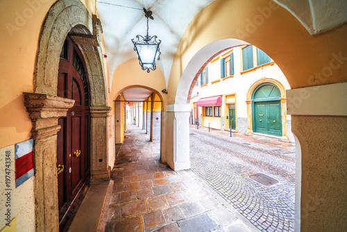 Wallpaper Mural Padova, Italy. Arcades and arches cobbled street of Padova view Torontodigital.ca