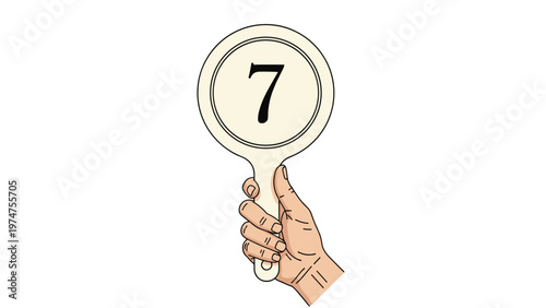 Hand with a light skin tone holding a round paddle sign featuring the number seven in black serif font for auction or judging.