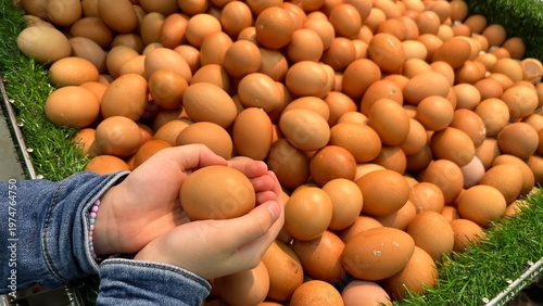 Kids hand holding some egg