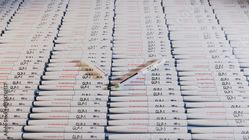 3d rendered image of a large collections of glucagon like peptide 1 or GLP-1 injection pens.