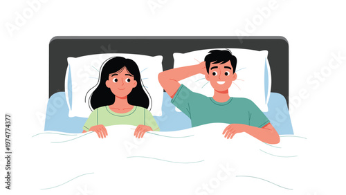 Happy couple sharing an intimate moment lying in bed together under white covers and looking at each other with love.