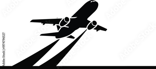 Airplane taking off in black silhouette