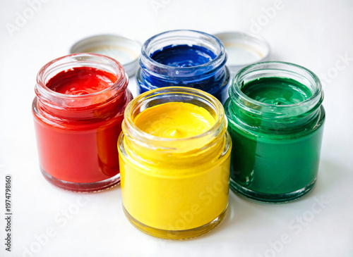 glass jars filled with bright colored paint 