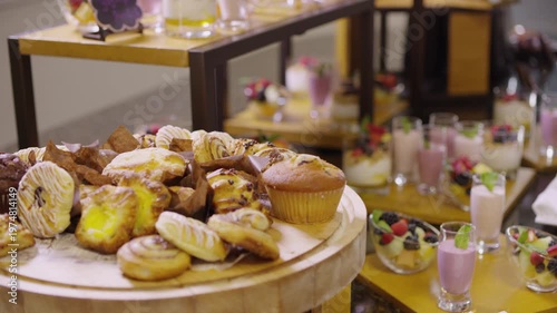 Wallpaper Mural Baked treats are displayed on a platter thats surrounded by fruity smoothies and fruit bowls. Torontodigital.ca