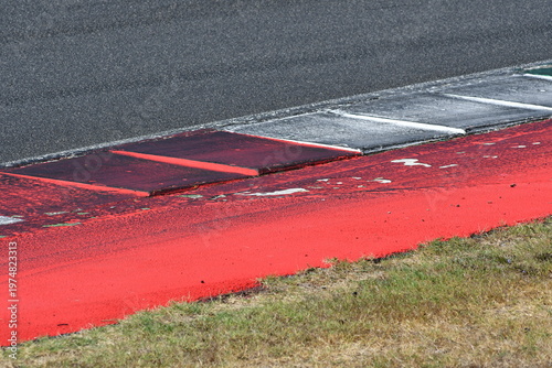 colored curb on a racing track