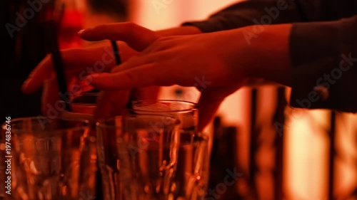 Mixing cocktails at a lively party in a warm atmosphere