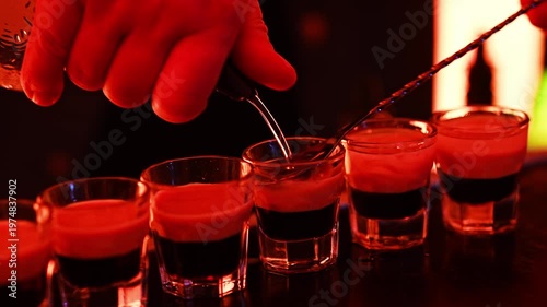 Mixing cocktails for a party with a bartender at a lively bar