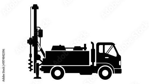 Drilling truck with auger equipment.
