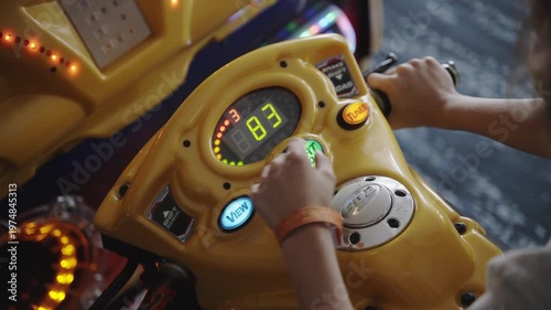 Wallpaper Mural A young boy rides an arcade motorcycle game Torontodigital.ca