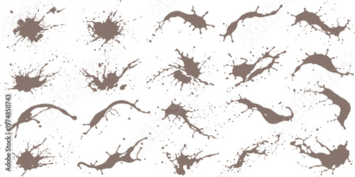 Dynamic set of dark brown mud splatters dirt splashes fluid grunge texture elements on white background off road splatter background isolated abstract movement elongated footprint