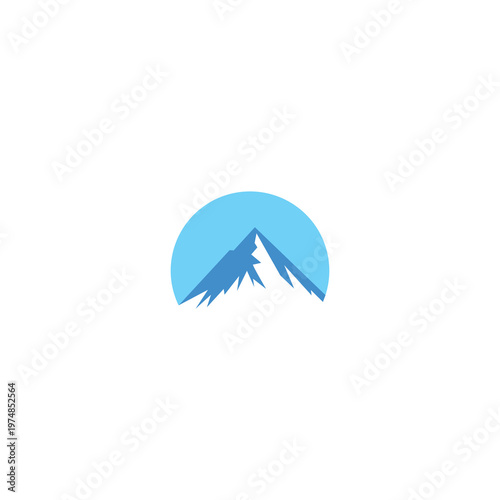 Mountain peak silhouettes against a vibrant blue sunset sky landscape