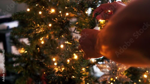 First person perspective decorating christmas tree