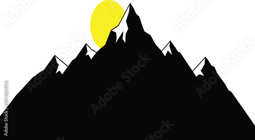 Silhouetted mountains with rising sun or moon