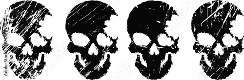 Four grunge black skull silhouettes with distressed texture on white background
