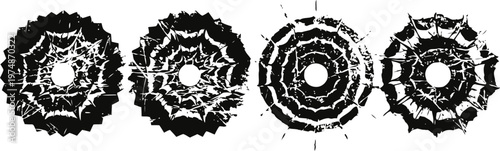 Set of four black and white spider webs with irregular patterns on transparent background