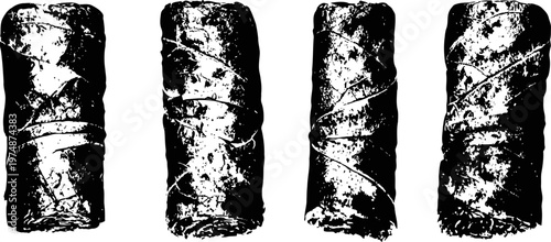 four ancient tribal clay seals with intricate patterns and textures on a white background