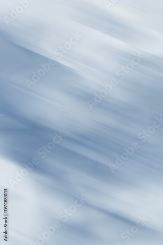 Soft abstract blue background with diagonal motion blur and gradient  gray tones in vertical. Abstract fast brush background. Minimal design, cool, light blue, silver, atmosphere, soothing visual con