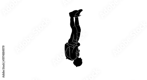 Man doing handstand on ground.