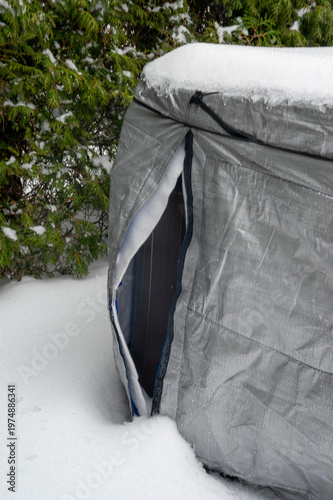Snowy Backyard with Covered Hot Tub in Cold Climate