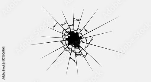 Bullet hole impact crack on glass with radial shattered lines in a bright studio.