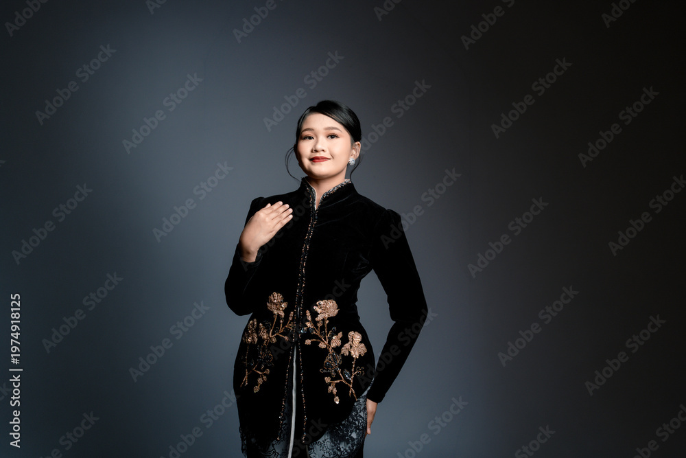 Fototapeta premium black kebaya with gold floral embroidery