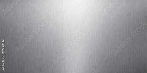 A sleek brushed metal plate featuring a shiny silver stainless steel texture and light gray industrial metallic pattern creates a polished aluminum surface backdrop for modern material design