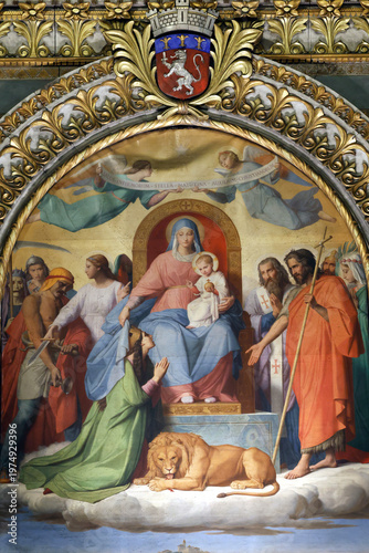 Basilica of Fourviere.  Madonna enthroned with Infant Jesus, saints, and a lion beneath coat of arms of Lyon. Lyon. France.