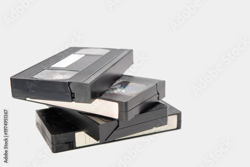 Old videotapes on a light gray background