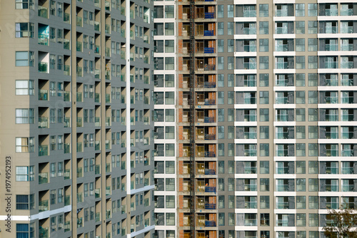 The repetitive grid of apartment building facades reveals urban density in a Vietnamese city.  Vung Tau. Vietnam.