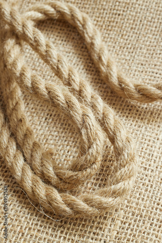 Close-up of twine on burlap representing sustainable packaging material