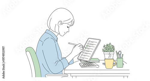Woman sitting at desk working laptop.
