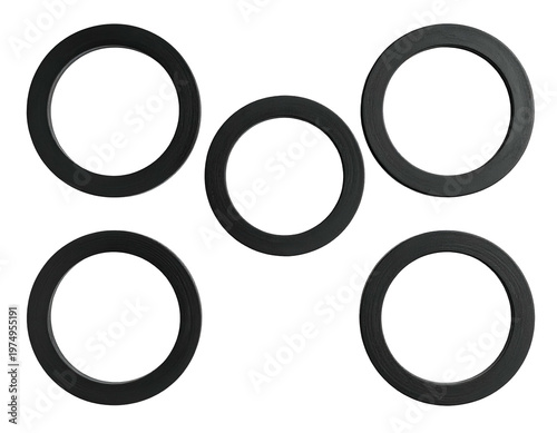 Five flat black rings arranged in a diamond-like pattern against a black background