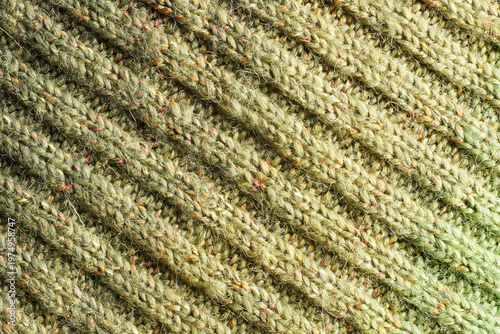 Full frame of the texture of knitted fabric made of wool thread.