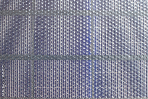Full frame texture of portable solar panel cell.