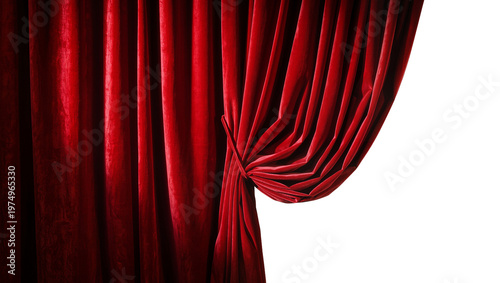 Isolated luxurious red velvet stage curtain elegantly draped and pulled aside for grand reveal