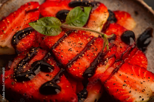Savory Strawberries with Balsamic Cream and Black Pepper on Handmade Ceramic Plate
