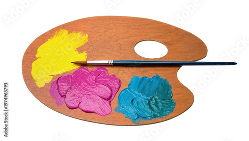 Tableau sur toile Isolated artist's wooden palette with vibrant yellow, magenta, and teal paint blobs and a paintbrush