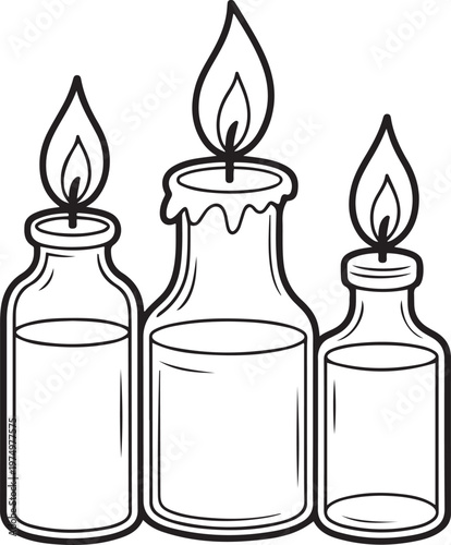 Three traditional candles in glass containers with lit wicks