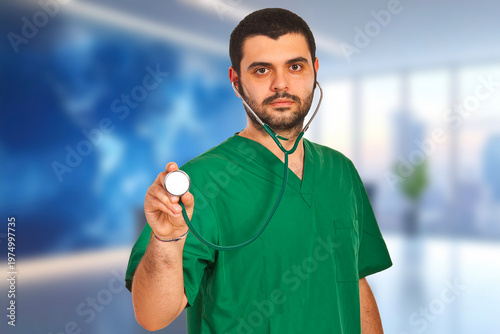 Young doctor holds stethoscope, focused, calm, professional